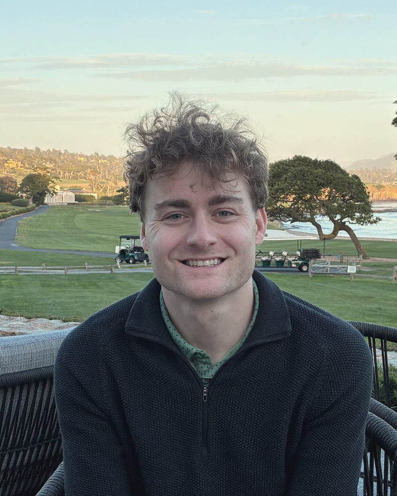 Max Smith, software engineer, on a terrace overlooking Carmel Bay, California, 2026